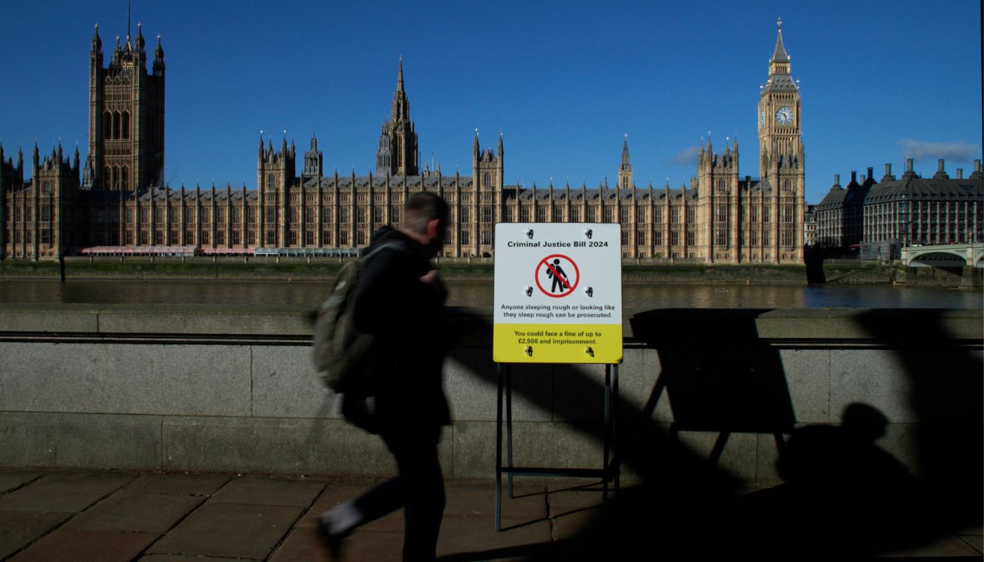 An imitation road sign standing across the river from the House of Commons in Westminster