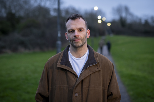 Man in park at dusk